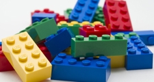 Lego Investe </br>US$ 145 mi em Linha